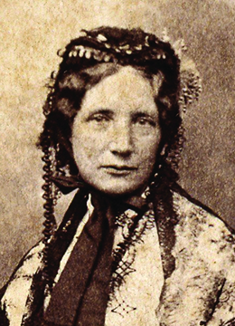 Uma fotografia de Harriet Beecher Stowe é mostrada.