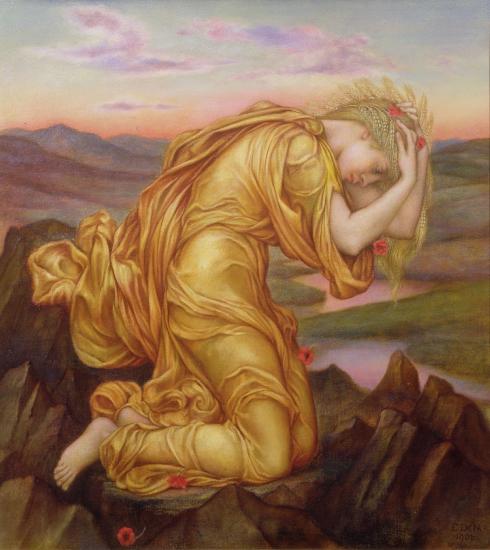 Demeter, wrapped in yellow dress, kneels on the ground, holding her wheat blond hair in distress. There are some red flowers.