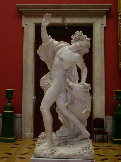 Statue of Adonis being gored by the boar. He's arching his back in pain with his hand on the boar, which is leaping behind him.
