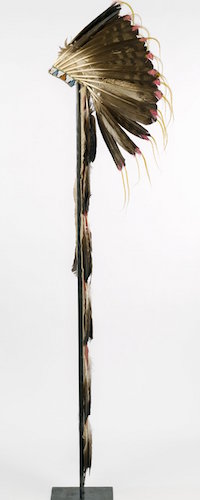 Sioux or Cheyenne Artist, Feathered War Bonnet (Pawhuska, Oklahoma), late 19th-early 20th c., feathers, beads, pigment, hide, dyed horsehair, 174 x 21.5 cm (The Brooklyn Museum)