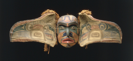 Transformation Mask, Kwakiutl population, British Columbia, Canada, wood paint, graphite, cedar, cloth, string, 34 X 53 cm closed, 130 cm open (Quai Branly Museum). "This transformation mask opens into two sections. Closed, it represents a crow or an eagle; when spread out, a human face appears. It was associated with initiation rites that took place during the winter. During these ceremonies, both religious and theatrical, the spirit of the ancestors was supposed to enter into men." (source)