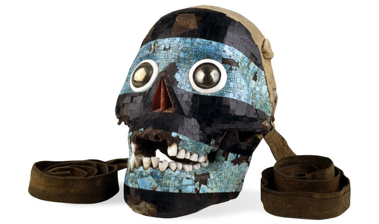 Mosaic skull of Tezcatlipoca, c. 15th-16th century C.E., Mixtec/Aztec, turquoise, pyrite, pine, lignite, human bone, deer skin, conch shell, agave, 19 x 13.9 x 12.2 © The Trustees of the British Museum