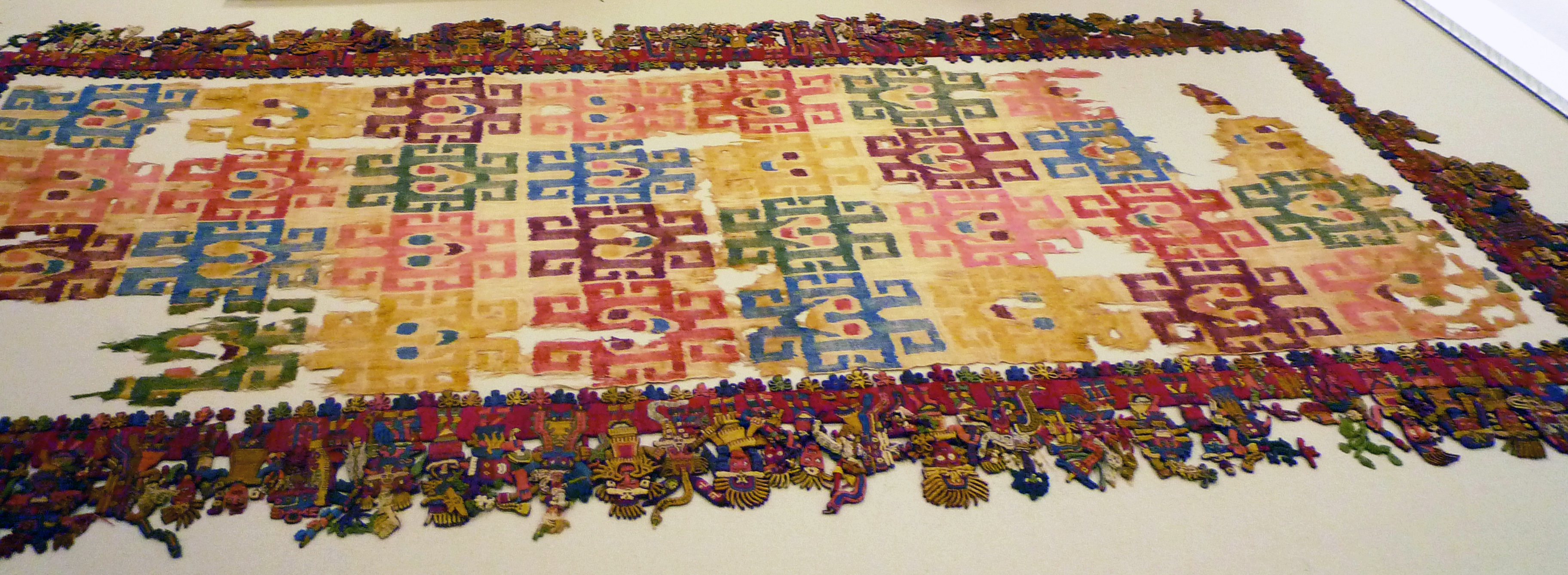 Nasca, Mantle ("The Paracas Textile"), 100-300 C.E., cotton, camelid fiber, 58-1/4 x 24-1/2 inches / 148 x 62.2 cm, found south coast, Paracas, Peru (Brooklyn Museum)