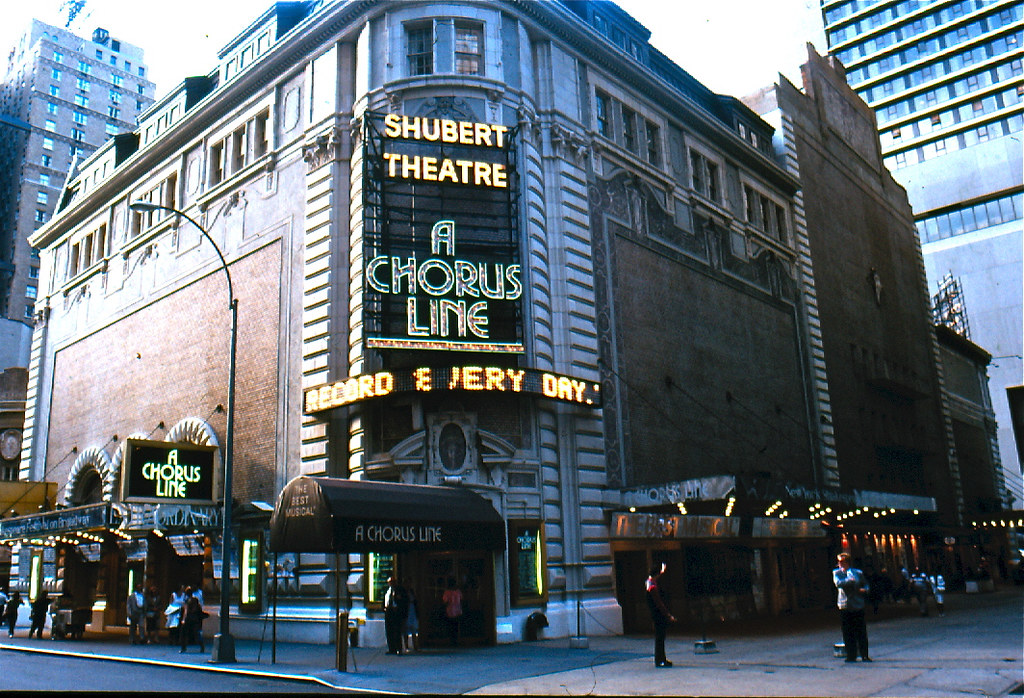 Exterior of the Shubert Theatre on Broadway. The marquee in front reads "A Chorus Line."