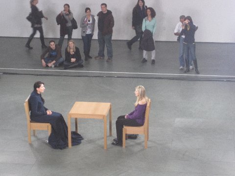 Marina Abramović sitting with Rebecca Taylor at The Artist is Present performance at The Museum of Modern Art, 2010