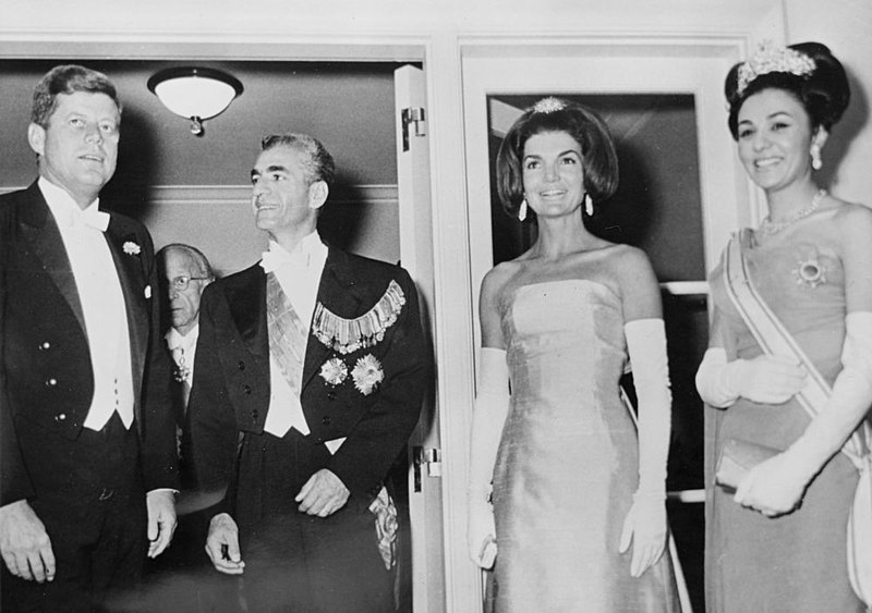 The Shah and his wife are pictured with the US president and his wife - Brief description in text