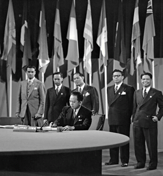 Carlos Romulo Filipino delegate and future UN President Signs the UN Charter on behalf of the Philippines