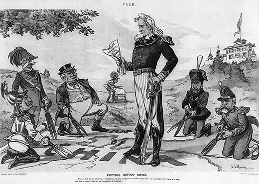 A cartoon captioned “Putting His Foot Down” shows Uncle Sam standing on a map of China, while Europe’s imperialist nations (Germany, Spain, Great Britain, Russia, and France) try to cut out their “sphere of influence” using large scissors. Austria sharpens its own scissors in the background. Uncle Sam holds a document labeled “Trade Treaty with China” and says, “Gentleman, you may cut up this map as much as you like, but remember, I'm here to stay, and you can't divide Me up into spheres of influence.”