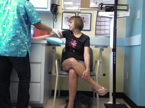 Image of a young woman at a doctor's office
