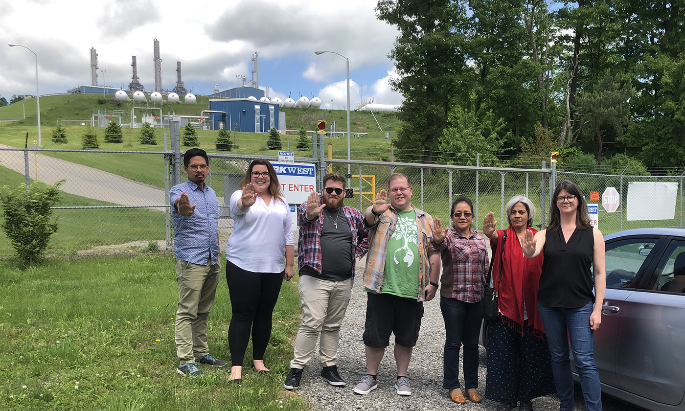 Image of #breakfreefromplastic activists in front of a petrochem facility in Pittsburgh.