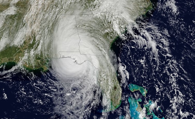 "Hurricane Michael moves over Florida on Oct. 10, 2018." by NASA Earth Observatory is in the Public Domain