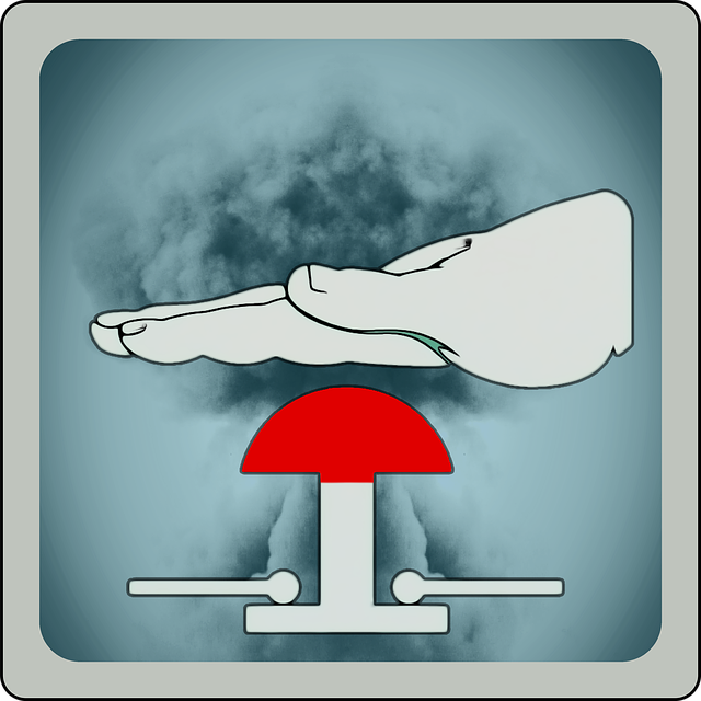 Clipart of a person's hand hovering over a big, red button