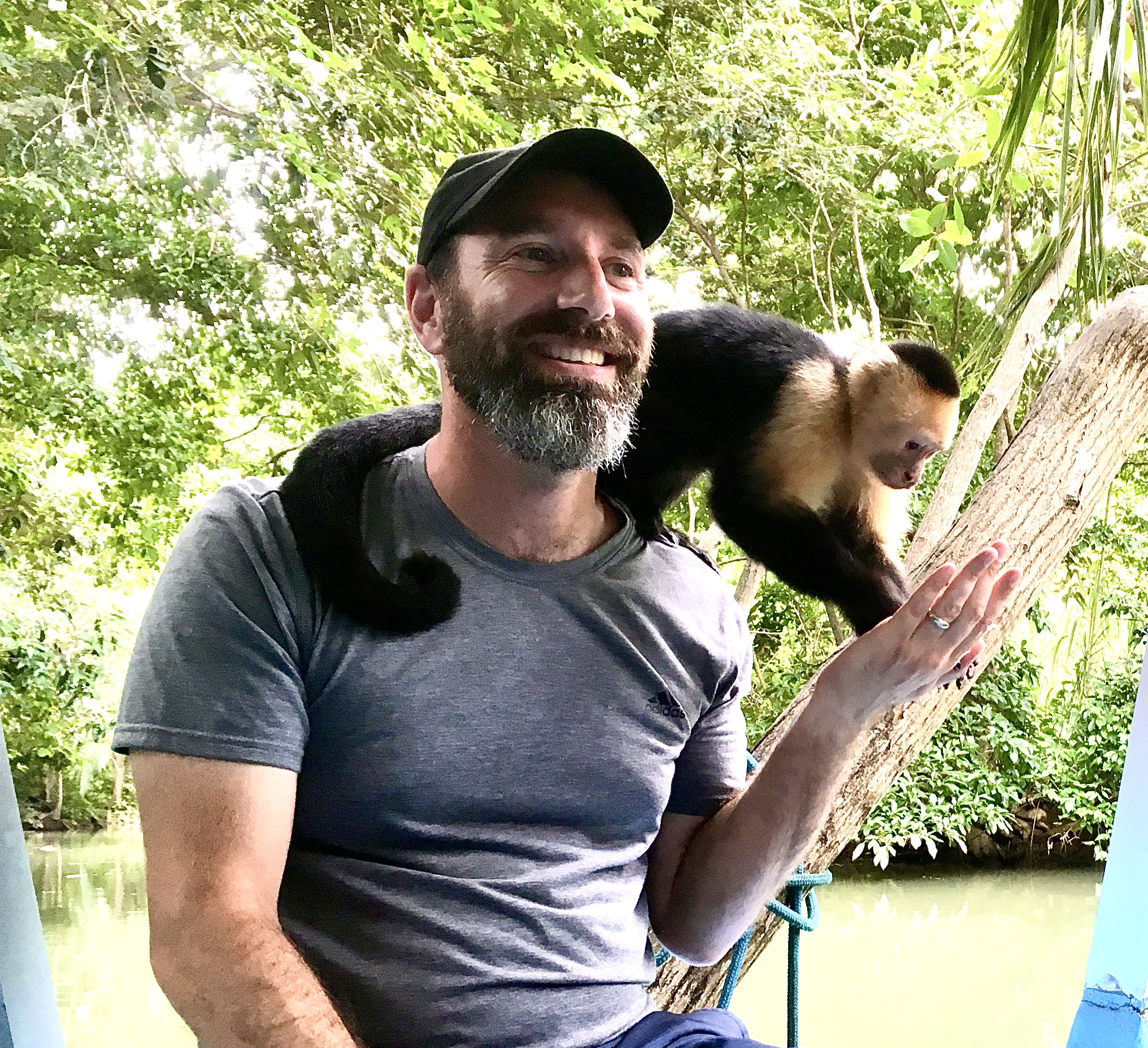 Josh in Costa Rica with a very friendly spider monkey