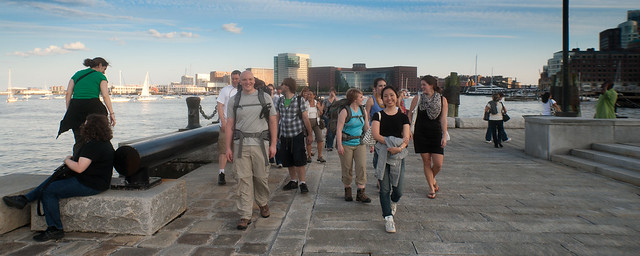 Image of people walking on a pier