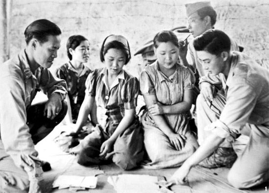 "Consolation women in Myitkyina , Myanmar , after their liberation by US soldiers, August 14, 1944" by US Army is in thePublic Domain
