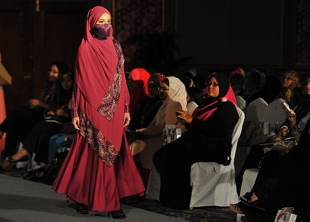 Image of a Muslim model walking in a fashion show