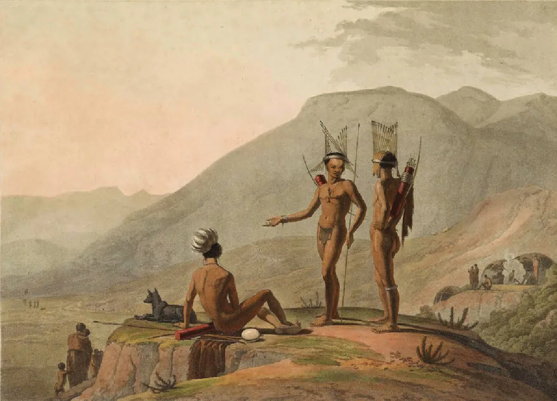 A drawing is shown of three people on a flat area of a hill. They all have dark skin and are naked except for small loincloths. The one on the left is sitting with his back showing, white feathers on his head and his bow and arrow on the ground to his left. A black dog-like animal sits in front of him. The other two men are standing, both with tall headdresses of thin slats with their bows and arrows on their backs. In the bottom left of the drawing, an adult in a brown cloak stands holding a small child while a naked child holds on to their leg. Two more people wearing cloaks are seen in front of them and other minute people are in the far distance. In the right of the picture six people are shown standing and sitting in front of rounded huts on a raised area. Smoke is shown rising up. The landscape is hilly with pale green, brown, and gray colors.