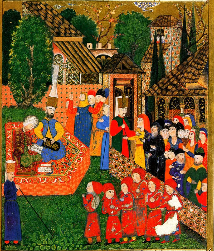 An image of a richly colored painting is shown. The image shows a figure in richly decorated red and green robes and a white turban sitting on an intricately decorated orange, green, black and white platform in the middle left of the image in a courtyard with a large green tree behind them. He is looking down at a white rectangle in his lap. Next to him sits another figure in yellow and blue robes with a very tall gold and white head dress, black beard, holding a black plate with gold circles on it. In the bottom left forefront of the image a tall figure holding a long, thin stick stands in long deep blue robes, red socks, black shoes, and a tall gold and white headdress on a deep green lawn. Six figures walk toward him dressed in red, dirty, worn robes with red scarves on their heads. Each carries a sack over their shoulder. A highly decorated wall is behind them with a large group of people in various colored robes standing looking at the group walking. Two figures at the front of the group speak with a man in red and black robes and a tall golden headdress standing at a doorway to the courtyard with the two seated figures. Another group of five figures stands behind the doorway in long robes and looks at the seated figures. Richly adorned brown and black buildings with colorful decor are seen in the background as well as trees, flowers, and a brown sky.