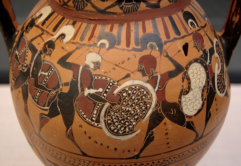 Greek hoplites facing each other in battle painted on a clay vessel.