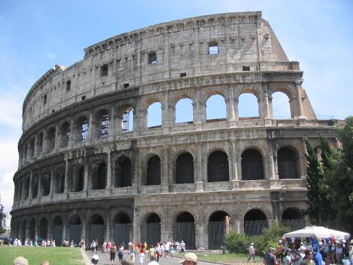 Picture of the Colosseum with contemporary tourists below.