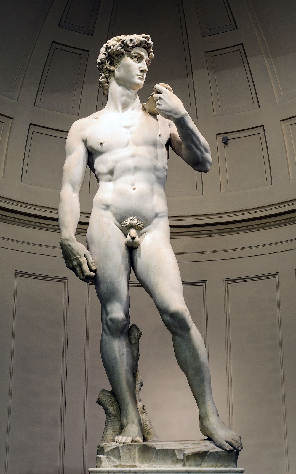 Michelangelo's The David, a towering marble sculpture of a nude David before his battle with Goliath.