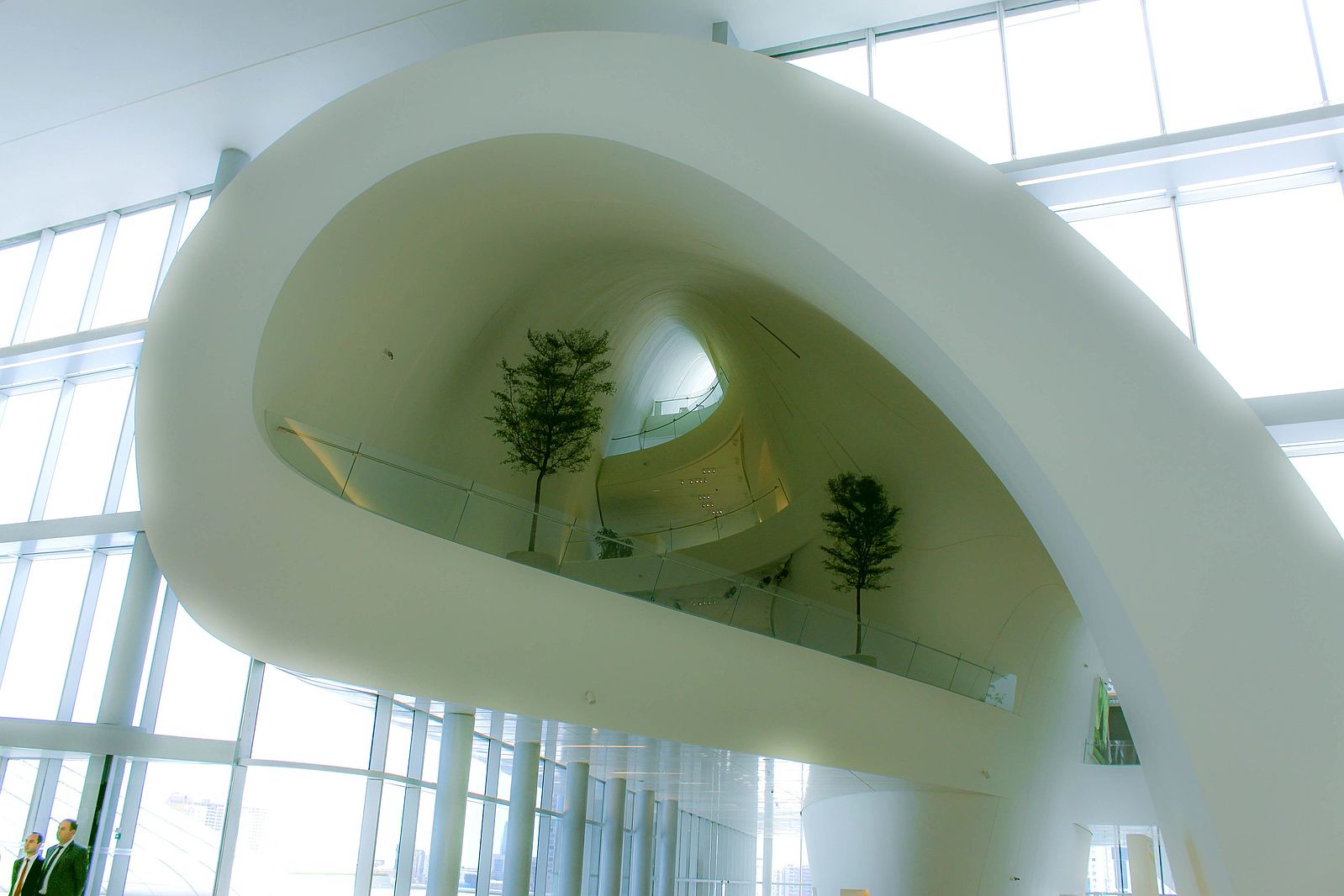 the interior of the building with a curved white platformed