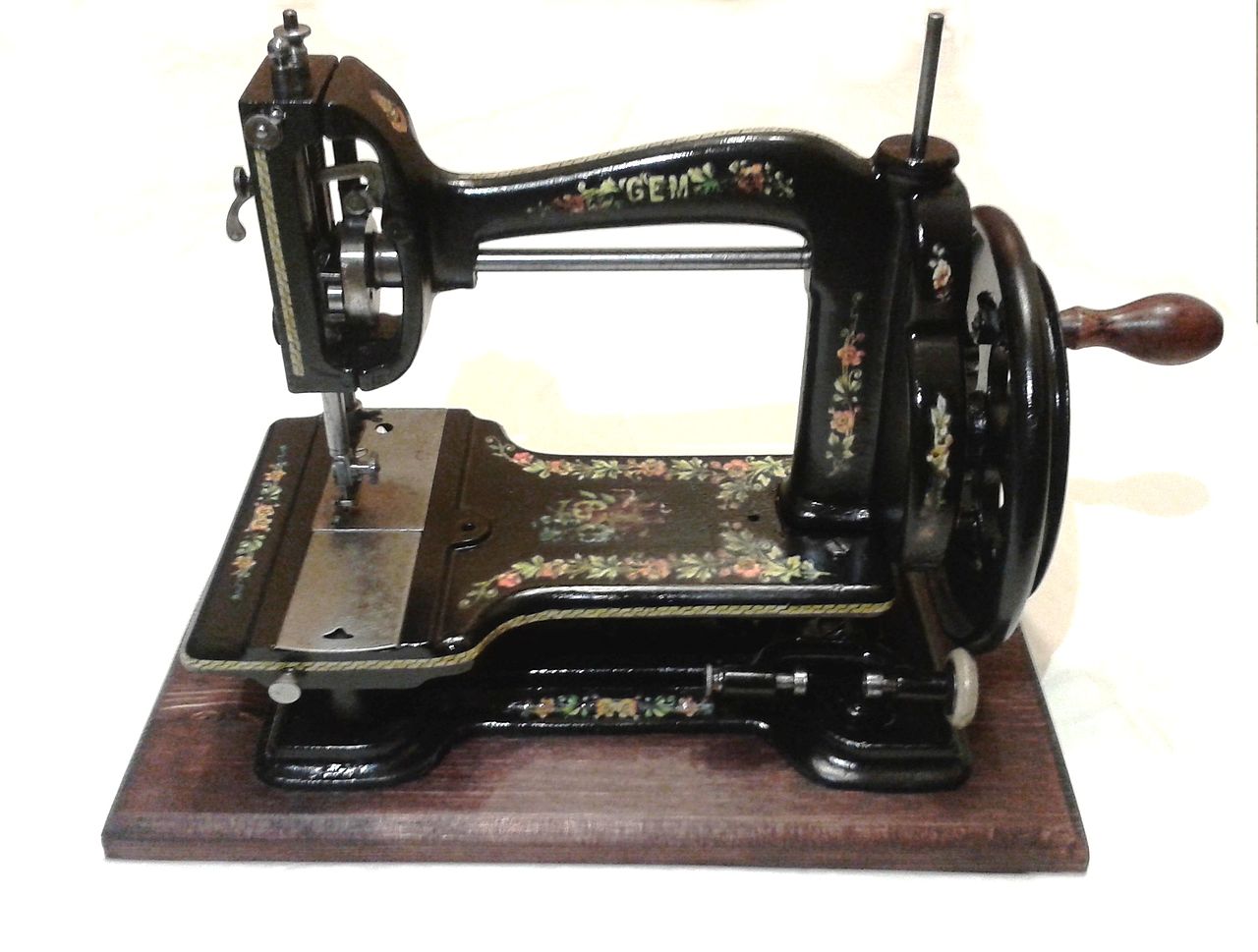 An ornate, cast iron late 19th century sewing machine.