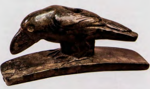 Figure 1.5: Raven-effigy platform pipe, Crab Orchard culture, Rutherford Mound, Illinois, 200 B.C.E.- 200 C.E. Stone, 2¾ x 4¾ in (6.2 x r2.2 cm). Illinois State Museum, Springfield, Illinois.