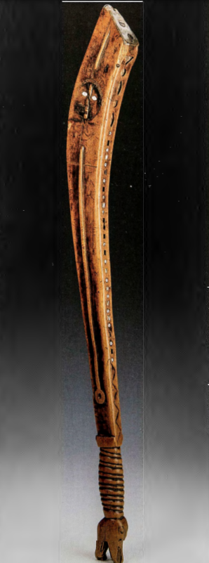 Figure 2.14: War club, Eastern Woodlands (Iroquois?), c. 1675. Hardwood, brass, iron, copper, and shell inlay, 24 in (60.9 cm) long. Thaw Collection, Fenimore Art Museum, Cooperstown, New York.