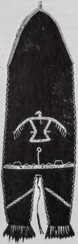Figure 2.17: Tabbed skin bag, Anishnabe , Great Lakes Region, c. 1790. Black-dyed deerskin , porcupine quills, silk binding, deer hair tassels, tin cones, 20½ x 6½ in (52 X 16.5 cm). Thaw Collection, Fenimore Art Museum, Cooperstown , New York.