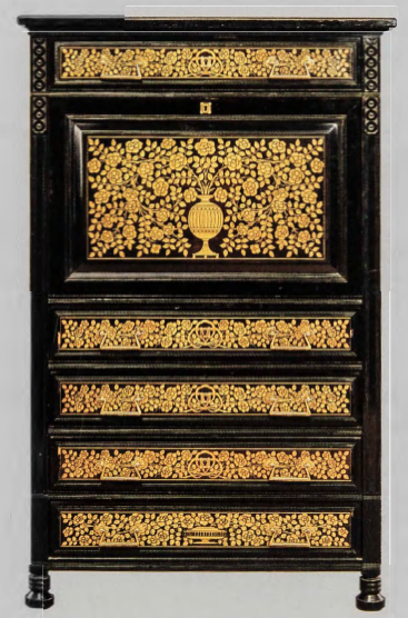 Figure 10.26: THE HERTER BROTHERS, Desk (for Jay Gould), 1882. Ebonized cherry, cherry, mahogany, Easter red cedar, butternut; marquetry of various woods; maple, hard maple, cherry, white oak (secondary woods); brass, printed suede, 54 X 34⅛ x 19 in (137.2 x 86.7 x 48.3 cm). Metropolitan Museum of Art, New York. Gift of Paul Martini.
