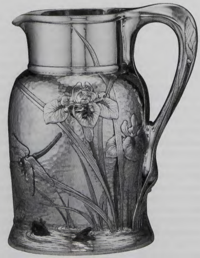 Figure 10.32: TIFFANY & co., Pitcher, c. 1878. Silver, with alloys of copper, silver, and gold, 8⅞ in (22.6 cm) high, 6¾ in (17.1 cm) wide. Art Institute of Chicago.