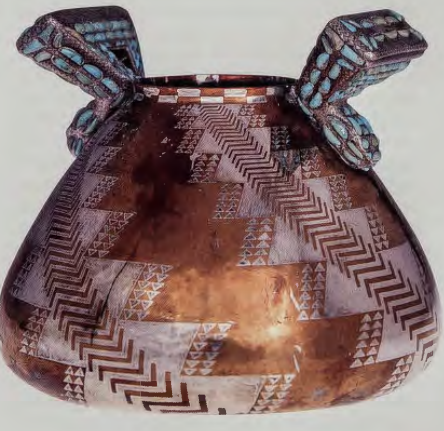 Figure 10.38:TIFFANY & CO., Bowl, American Indian style, 1900. Silver, copper, turquoise, 7½ in (19 cm) high. High Museum of Art, Atlanta, Georgia.