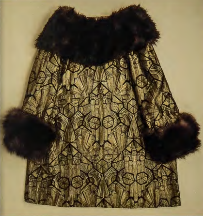 Figure 14.4: UNKNOWN ARTIST, Evening Wrap, c. 1928. Compound weave of gold, yellow, and black silk trimmed with brown-dyed skunk. Metropolitan Museum of Art, New York. Gift of the Fashion Group, Inc., 1975.
