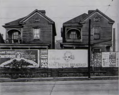 Figure 16.24: WALKER EVANS, Houses and Billboards in Atlanta, from American Photographs, 1931. Gelatin silver print, 6½ x 9⅛ in (16.5 x 23.1 cm). Library of Congress, Washington, D.C.