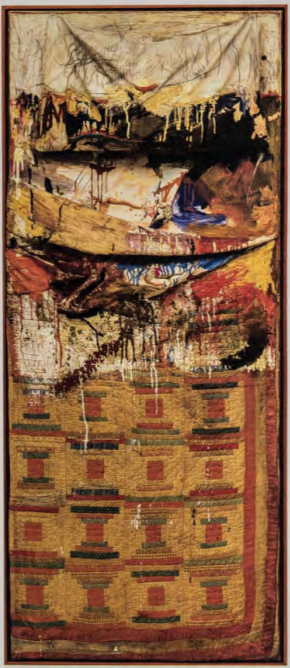 Figure 17.17: ROBERT RAUSCHENBERG , Bed, 1955. Combine painting, oil and pencil on pillow, quilt, and sheet, mounted on wood, 6 ft 3¼ in x 2 ft 7¼ in x 6 ft ⅛ in (191.1 x 80 x 16.5 cm). Museum of Modern Art, New York. Gift of Leo Castelli, 1989.