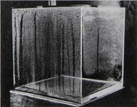 Figure 18.27: HANS HAACKE, Condensation Cube, 1963-5. Acrylic, water, light, air, currents, and temperature, 12 x 12 x 12 in (30.4 x 30.4 x 30.4 cm). Collection of the artist.