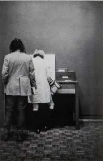 Figure 18.28: VITO ACCONCI, Proximity Piece, performed at the "Software" exhibition, Jewish Museum, New York, 1970.