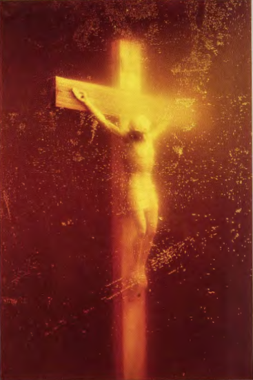 Figure 19.13: ANDRES SERRANO, Piss Christ, 1987, edition of 4. Cibrachrome, silicone, Plexiglas, wood frame, 60 x 40 in (152.4 x 101.6 cm). Paula Cooper Gallery, New York.