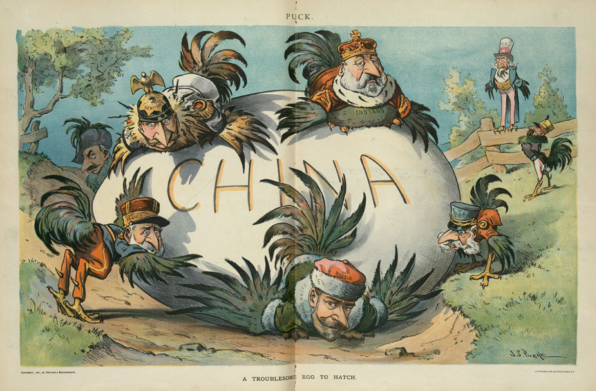 A cartoon drawing shows a large white egg labeled “China” lying on its side in the middle of a dirt road. The cartoon includes eight chickens, each with a man’s bearded face and wearing clothes. Underneath the egg, getting rolled over, is a chicken wearing a red and white king’s hat labeled “Russia” and a green coat with white trim. To the left pushing on the egg is a chicken in orange pants, a blue coat and a red hat labeled “France.” Atop the egg there are two chickens - the one on the left wears a white military coat and a helmet with a figure on it, labeled “Germany,” while the one on the right wears a gold and red king’s crown with a red coat with white and black trimmed fur. The belly is labeled “England.” To the bottom right of the egg is another chicken wearing a blue top hat labelled “Austria” and a red coat, sticking its tongue out at the Russian chicken. A chicken stands in the background on the right wearing red striped white pants and a black coat, a hat labelled with ‘Japan.” A chicken that is dressed in a long blue coat, yellow vest and white pants with red stripes and a hat labelled “U.S.” is perched on a fence in the rear right. A man’s head with a black helmet with “Italy” written on it is peeking out from behind the egg on the left. Grass and trees are in the background.