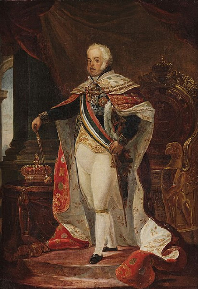 In this painting, King Joao VI wears an ornate uniform, decorated by medals and jewelry. His left hand rests on the hilt of a sword. He carries a scepter in his right hand. A crown sits nearby.