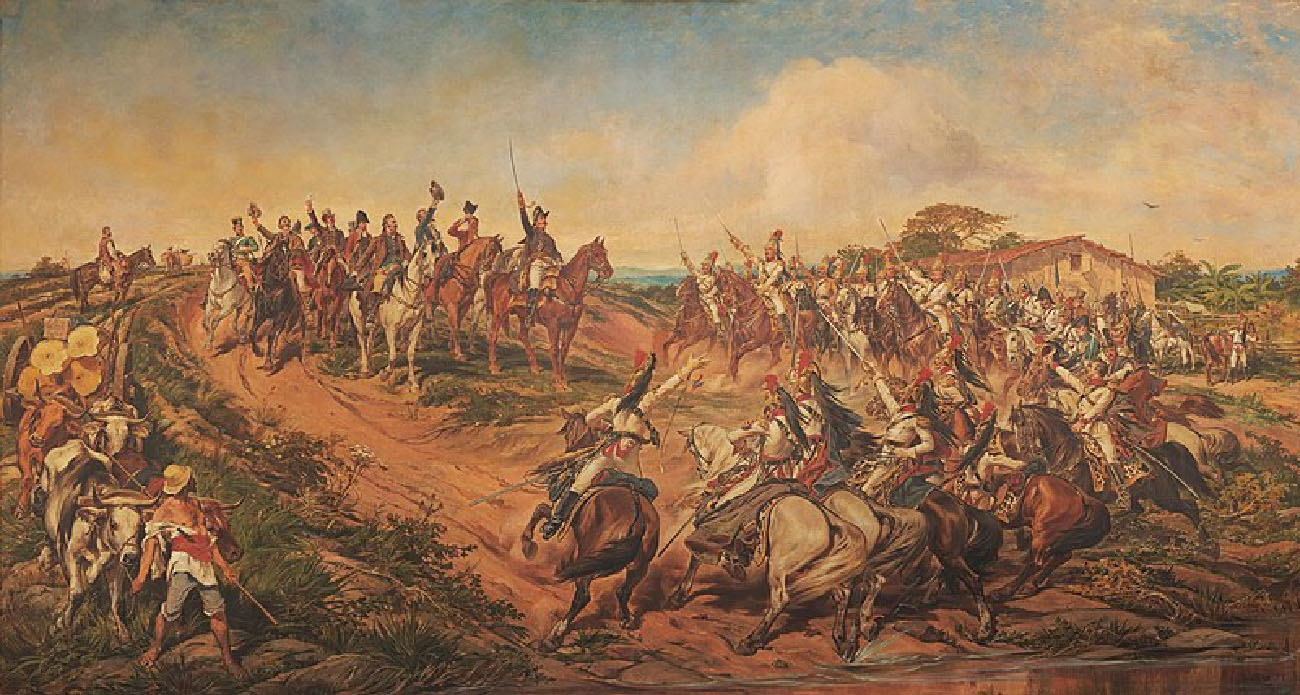 Pedro I is in the center of the painting. He rides a horse and holds his sword in the air. A group of men behind him are also on horses and hold their hats in the air. A group of uniformed soldiers on horseback face him and raise their swords in the air. A farmer leading his cows looks at the group.