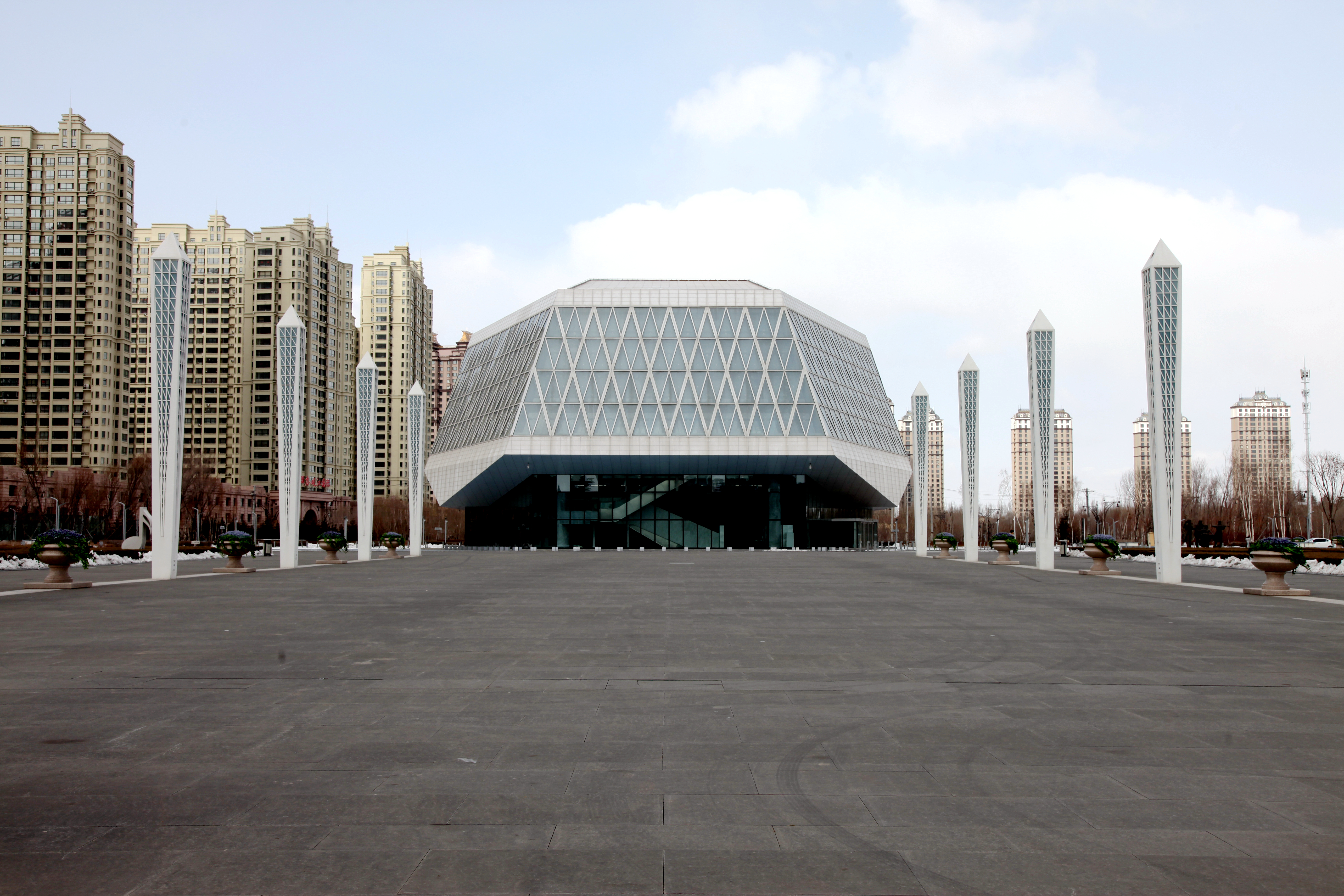 domed building in white steel and glass