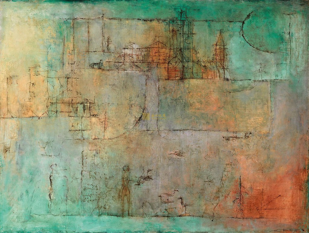 green and orange paper with drawings of a city