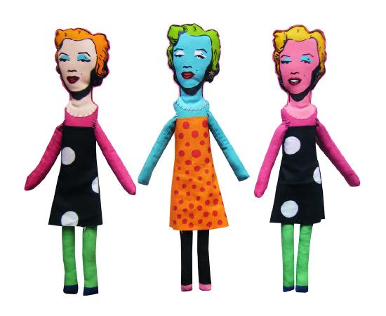 three cloth dolls with copies of Andy Warhol's portrait of Marilyn Monroe in different bright colors as the head