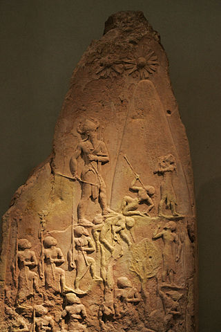 Photo of a slab depicting the scene described in the caption.