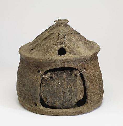 This is a photo of a cinerary hut urn. This Villanovan urn likely replicates the form that pre-Roman Latin huts assumed before the mid-seventh century BCE.