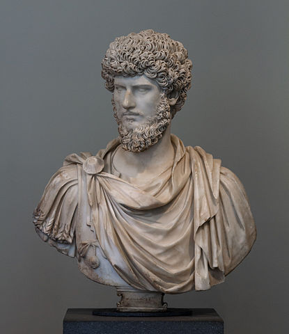 This is a photo of a bust of Lucius Verus, the adopted brother of Marcus Aurelius. He, too, has curly hair and a long, curly beard.