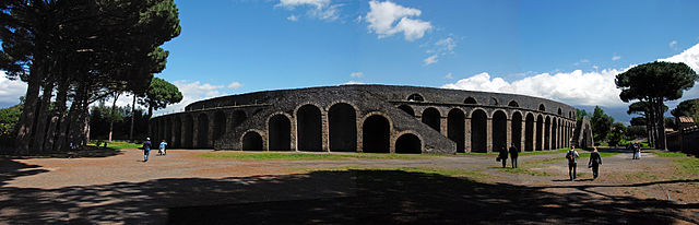 This is a current-day photo of the exterior of the Amphitheater of Pompeii, built around 70 BCE.