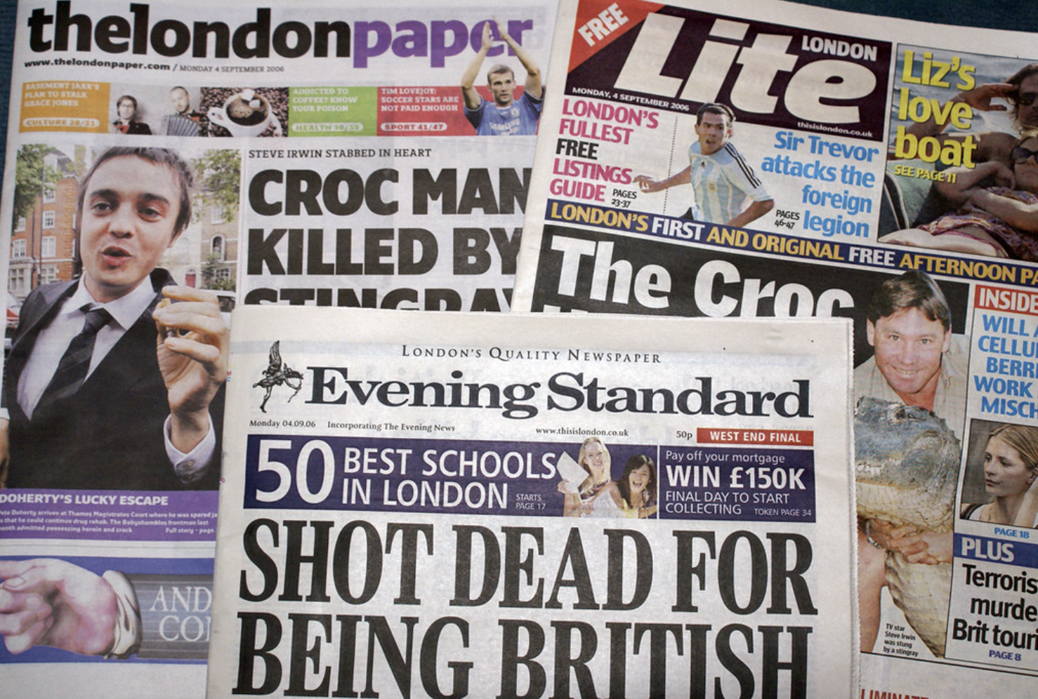 newspapers stacked on top of each other